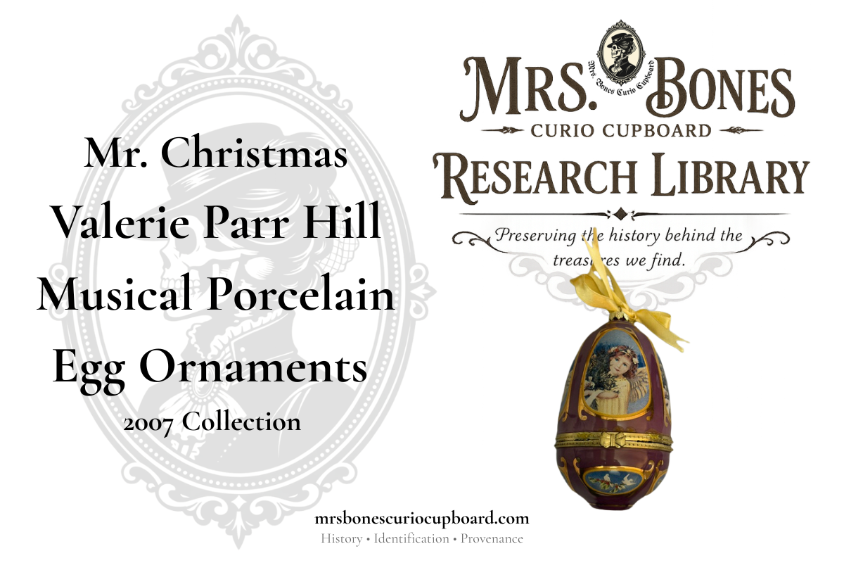 Cover image for the Mrs. Bones Curio Cupboard Research Library featuring the 2007 Mr. Christmas Valerie Parr Hill Musical Porcelain Egg Ornament collection with a purple Victorian angel musical trinket box ornament.