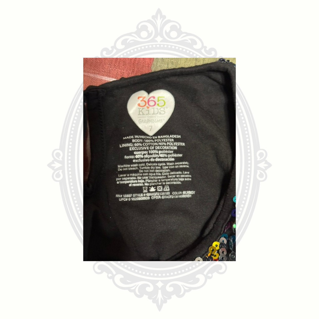 365 Kids by Garanimals size 7 clothing tag showing material and care details