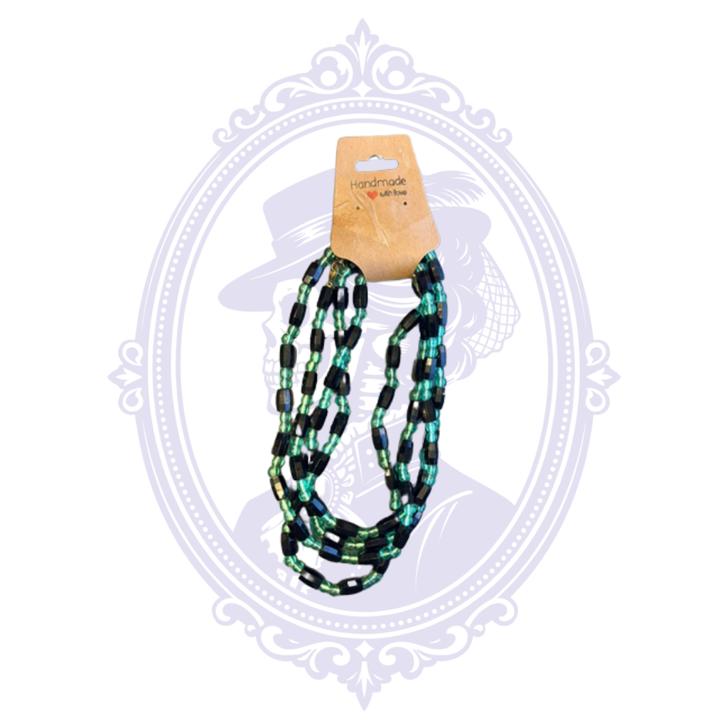 Black and teal 48-inch multi-strand beaded statement necklace with rectangular black beads and translucent teal accents.