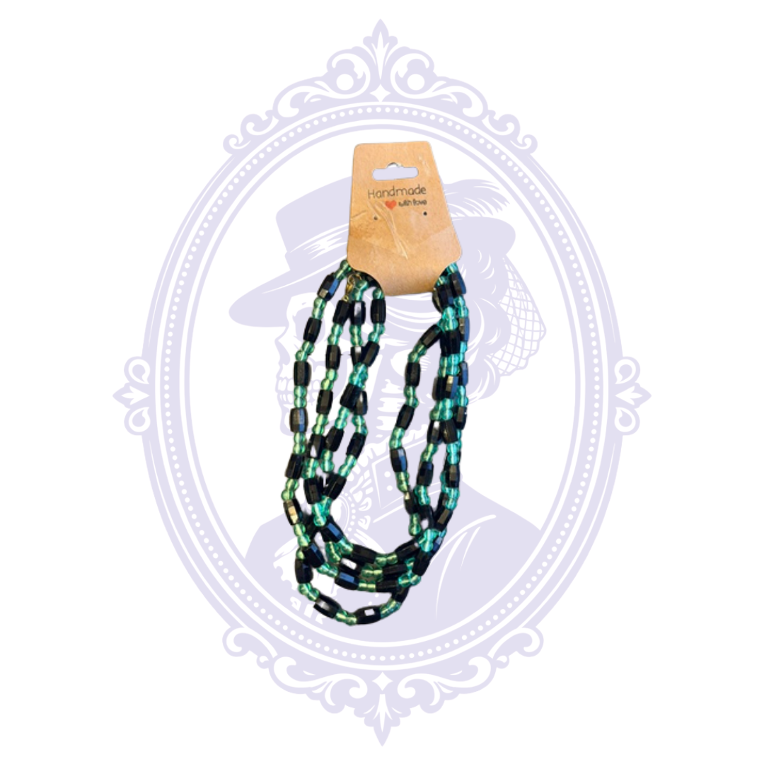 Black and teal 48-inch multi-strand beaded statement necklace with rectangular black beads and translucent teal accents.