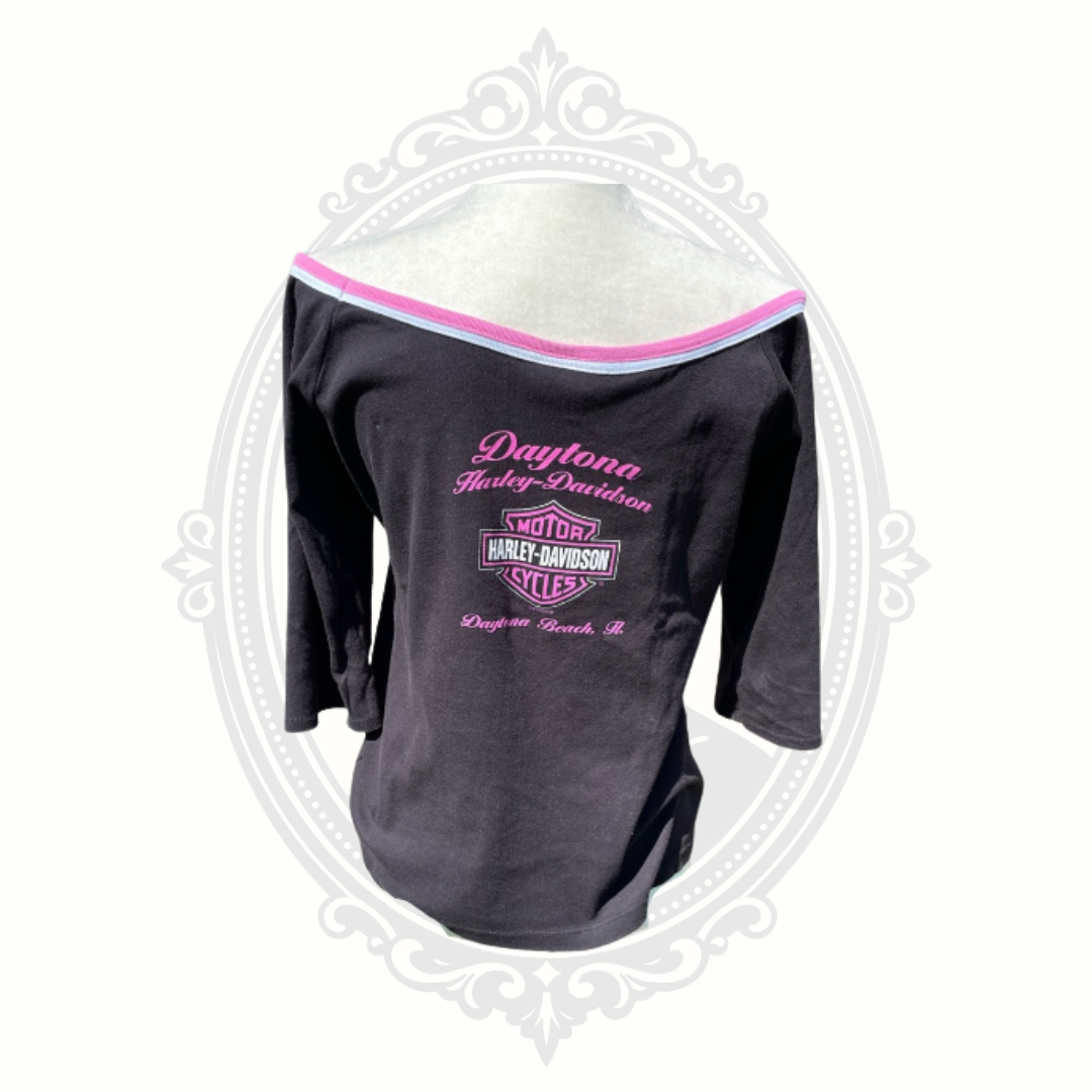Back display view of vintage Harley-Davidson black tank top featuring pink graphic artwork.