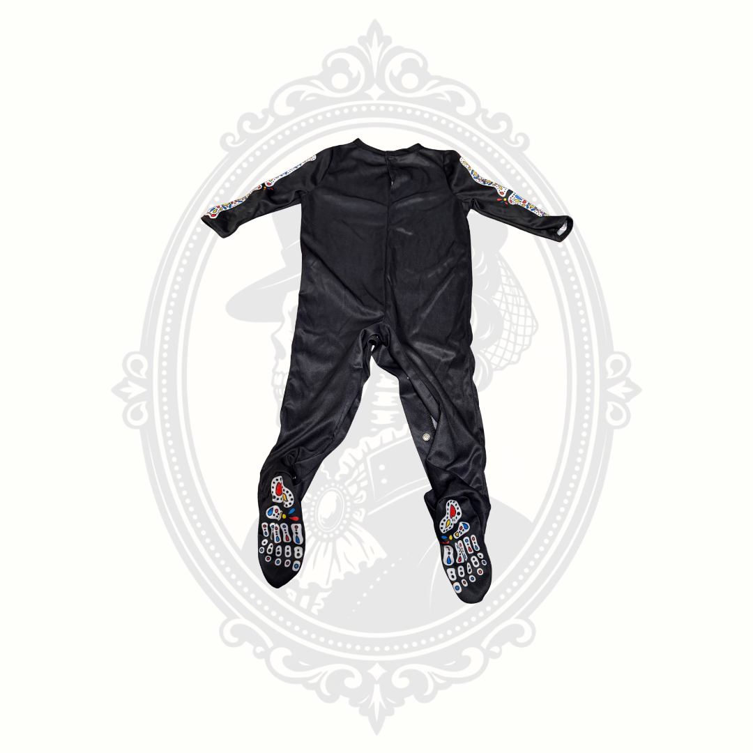 Back view of black baby skeleton sleeper costume with colorful detailing on sleeves and feet