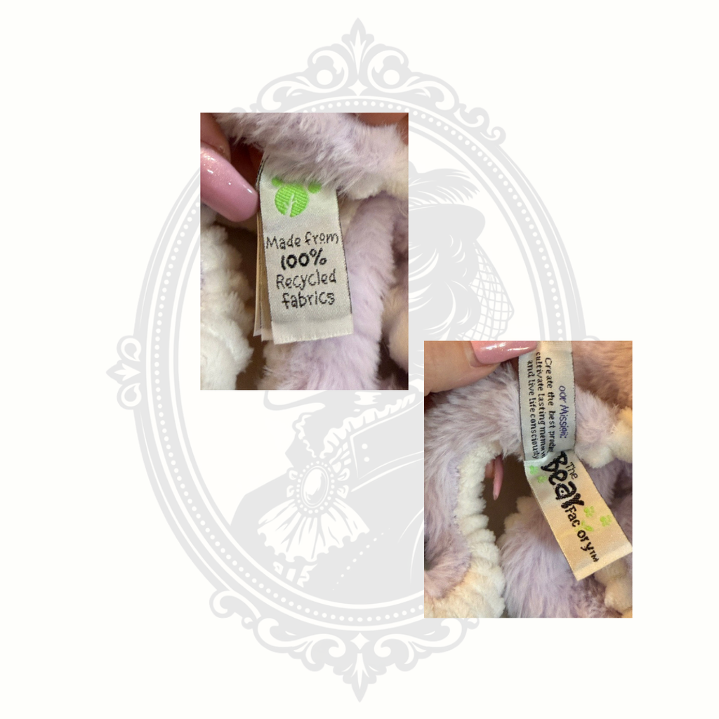 Product tags showing The Bear Factory branding and recycled fabric materials.