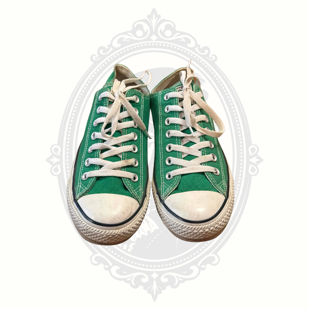 Converse green canvas sneakers angled front view