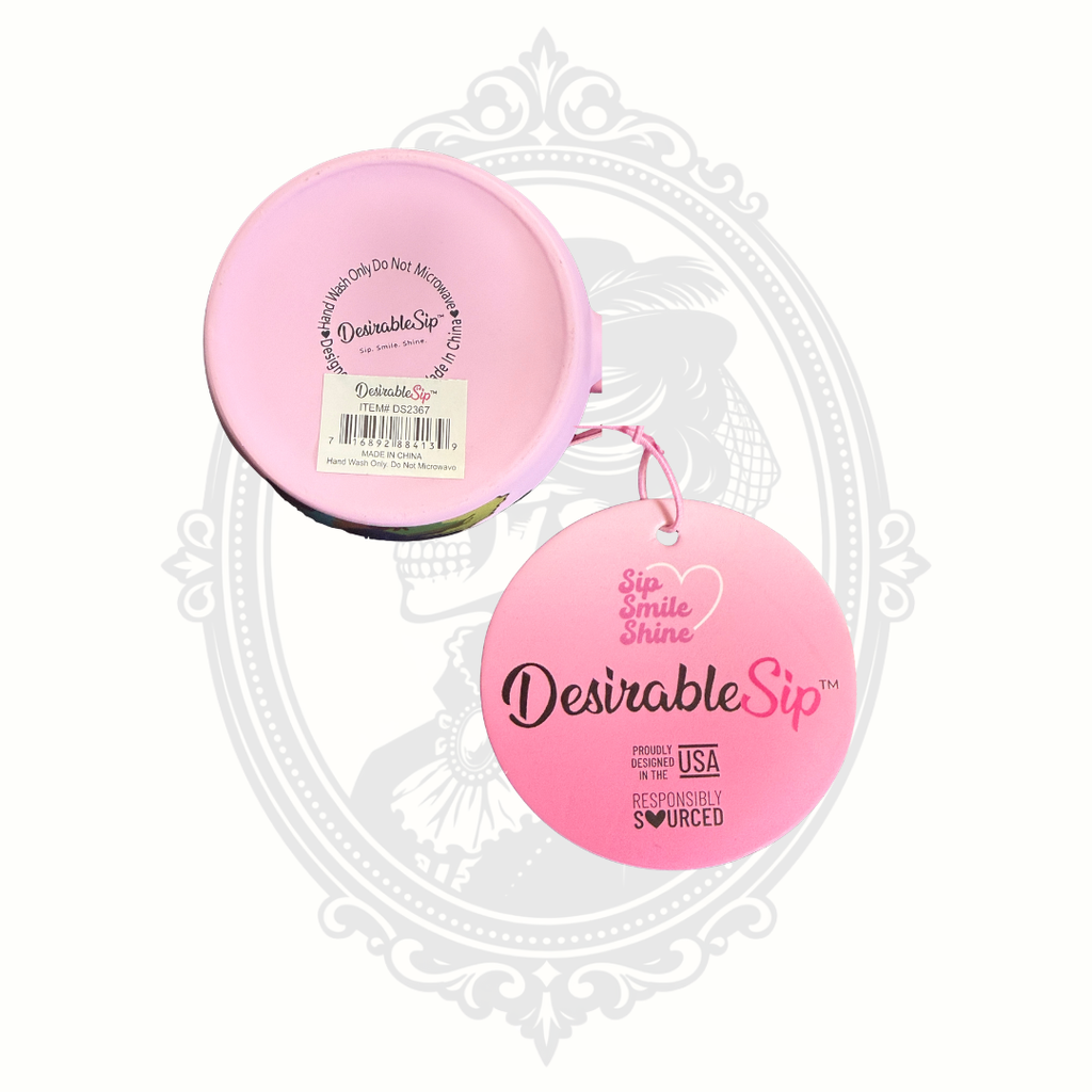 Bottom of pink DesirableSip stoneware mug showing original tag, branding, care instructions, and product information.