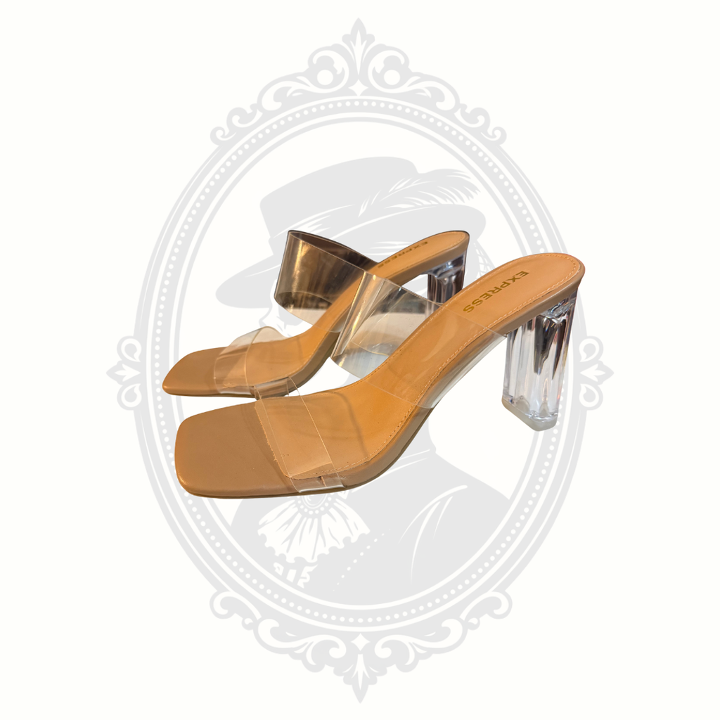 Side profile of Express clear strap mule heels with square toe styling and transparent block heels.