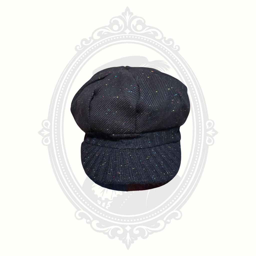 Front view of girls black knit newsboy cap with multicolor sparkle detail