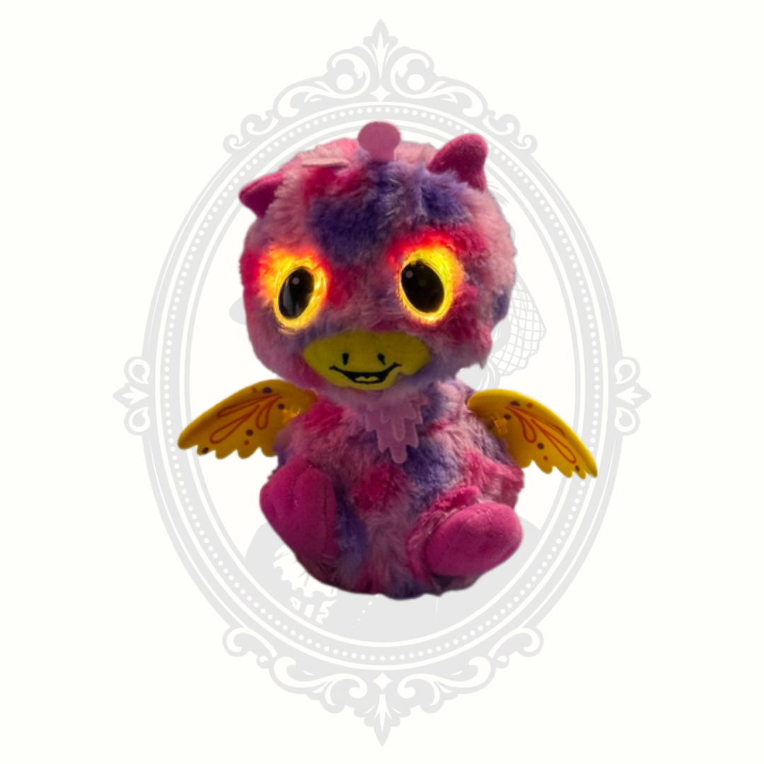 Hatchimals Pixies flying dragon plush with glowing illuminated eyes turned on