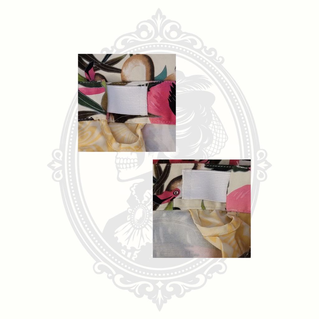 Interior waistband detail of Loudmouth flamingo tropical print golf shorts with elastic section
