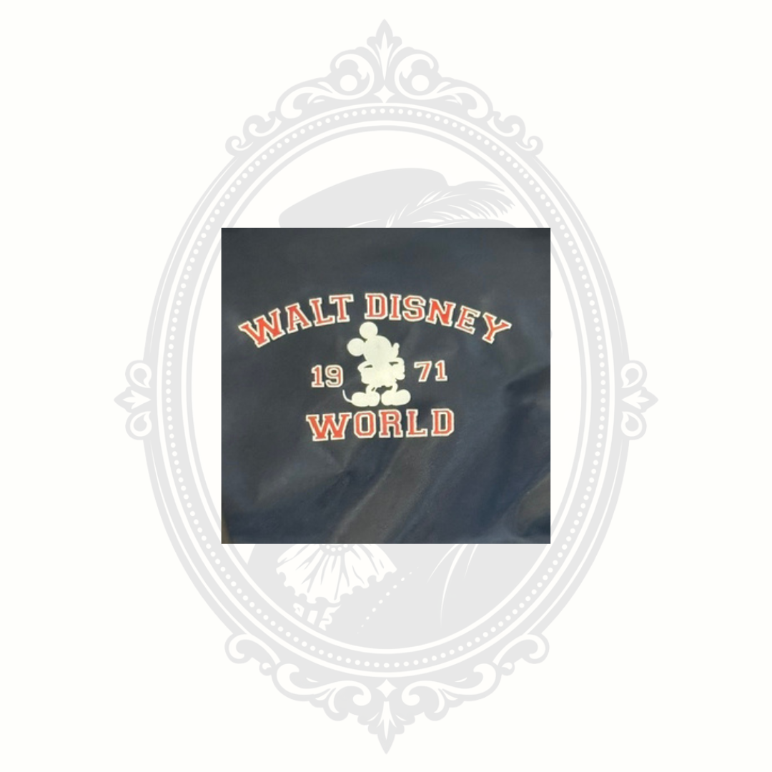 Walt Disney World 1971 logo with Mickey Mouse graphic on navy travel bag