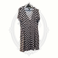 Front view of Midnight Hour black and gray checkerboard dress with button-front detail and short sleeves