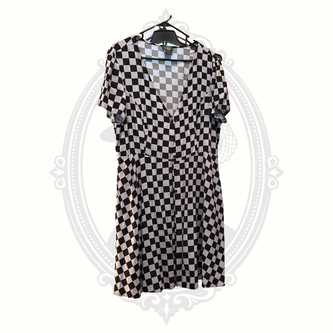 Front view of Midnight Hour black and gray checkerboard dress with button-front detail and short sleeves