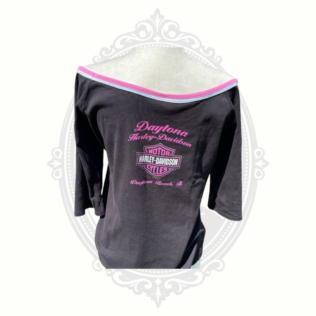 Back flat lay image of vintage Harley-Davidson black tank top with pink graphic print.