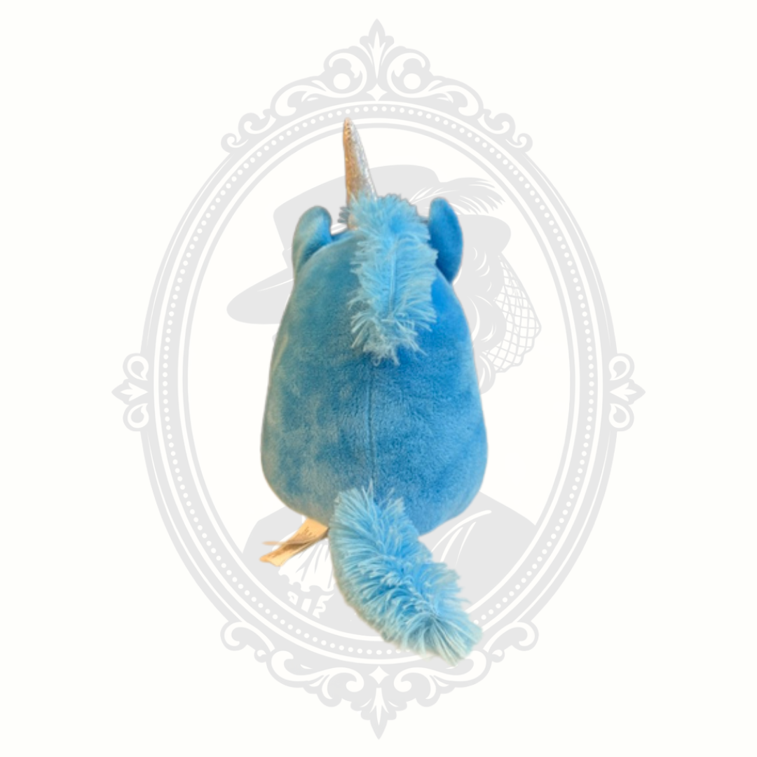 Back view of a blue unicorn dog plush showing fluffy blue mane, soft tail, and rounded plush body.