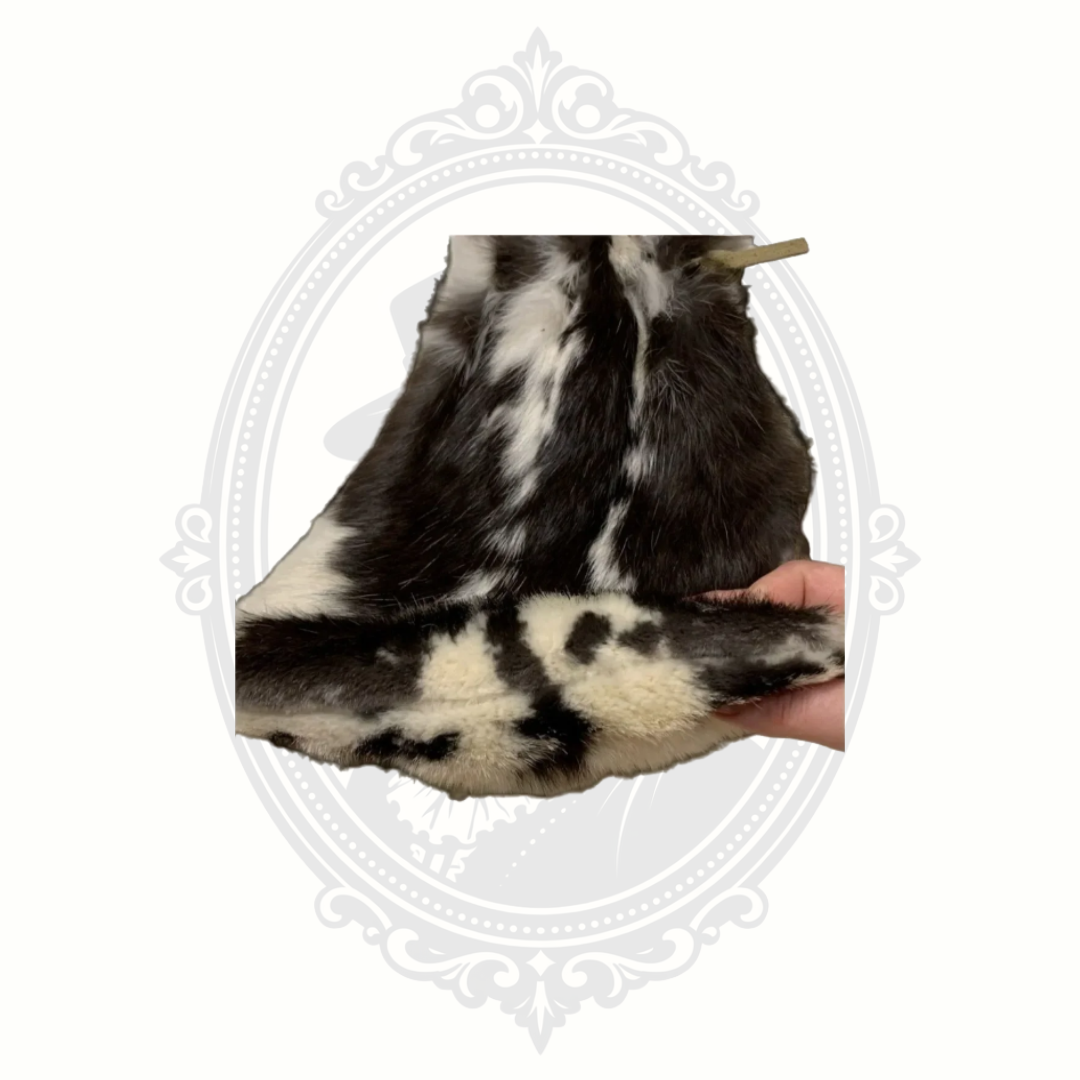 Bottom detail of genuine rabbit fur purse showing natural fur pattern and texture