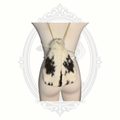 Front view of genuine rabbit fur drawstring backpack purse in white and brown fur
