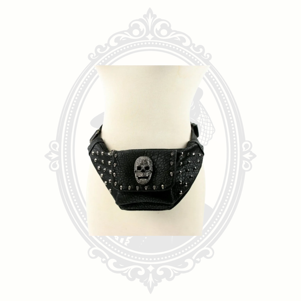Front display of black vinyl studded skull waist bag with rhinestone skull centerpiece
