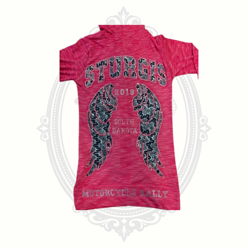 Close-up Sturgis wing graphic on pink hoodie
