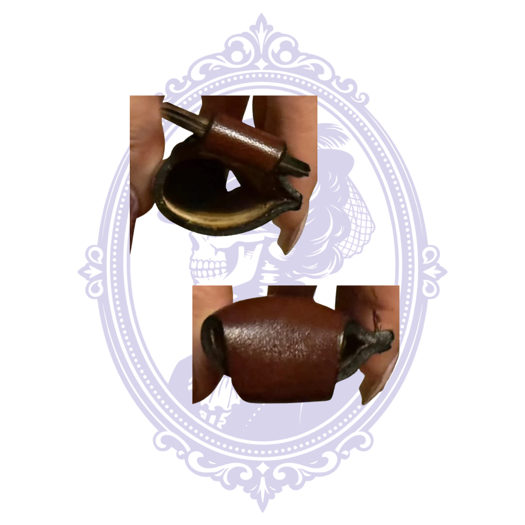 Close-ups of open end and stitched construction of vintage leather lighter holder