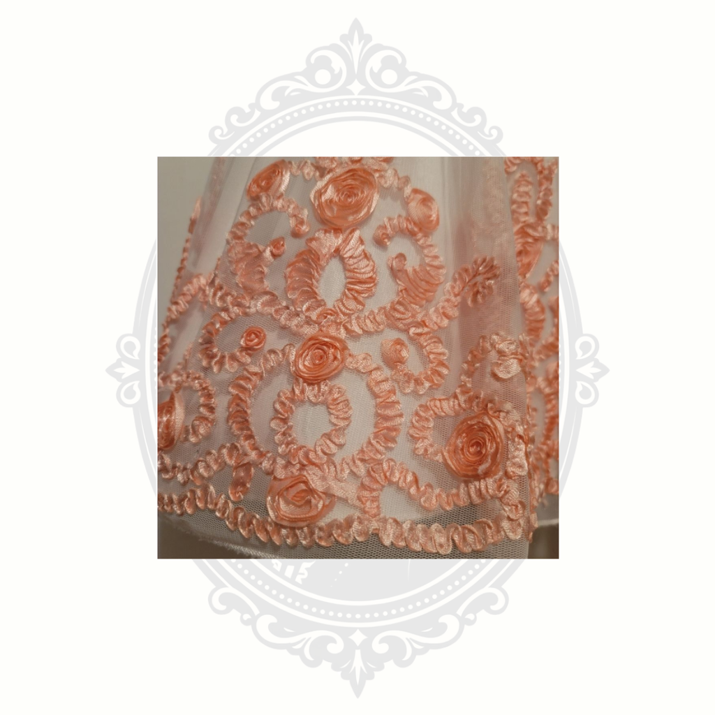 Peach embroidered floral detail on toddler formal dress