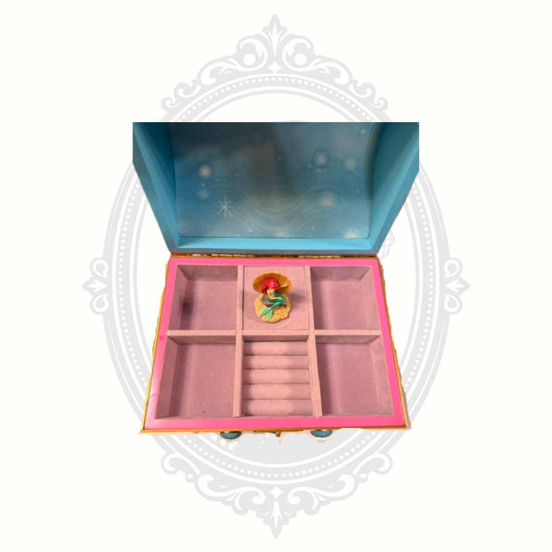 Disney Ariel jewelry box interior with divided compartments and ring slots