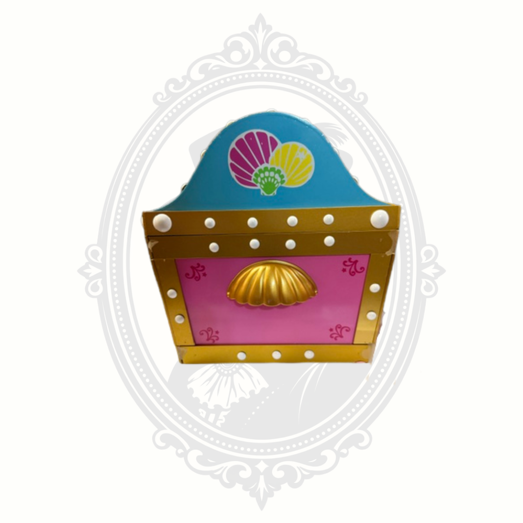 Side detail of Little Mermaid jewelry box with decorative shell and gold trim