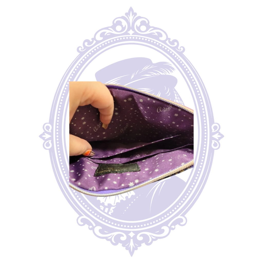 Purple Asteria by Alice Chan Paris-themed clutch beside original branded dust bag