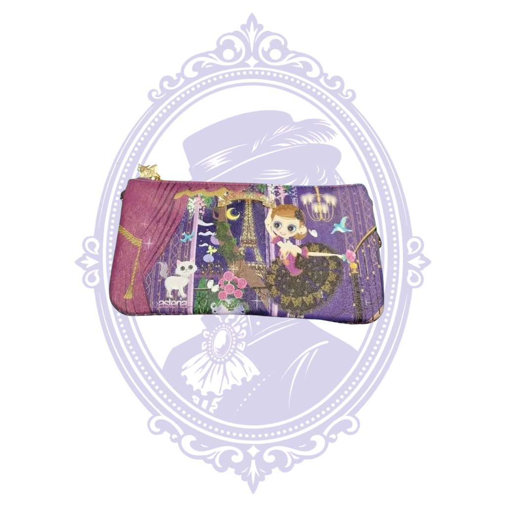 Close-up of purple patterned clutch and star charm