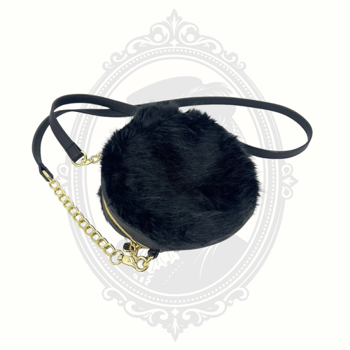 Front view of Betsey Johnson trolls canteen-style crossbody bag with novelty detailing.