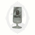 Front view of Bitburger pils glass photographed in brighter lighting to show clarity and logo detail.