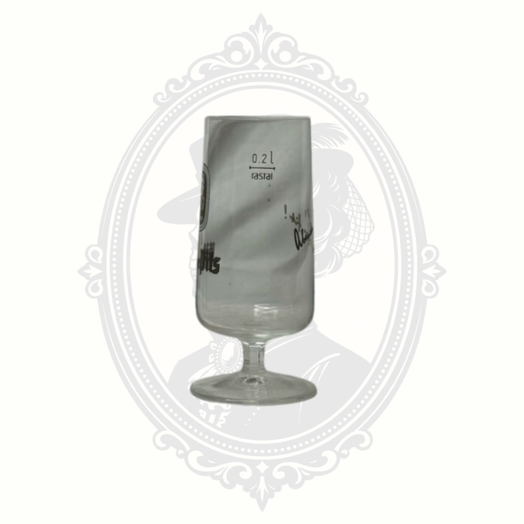 Detail view of Rastal branding and etched markings on Bitburger pilsner glass.