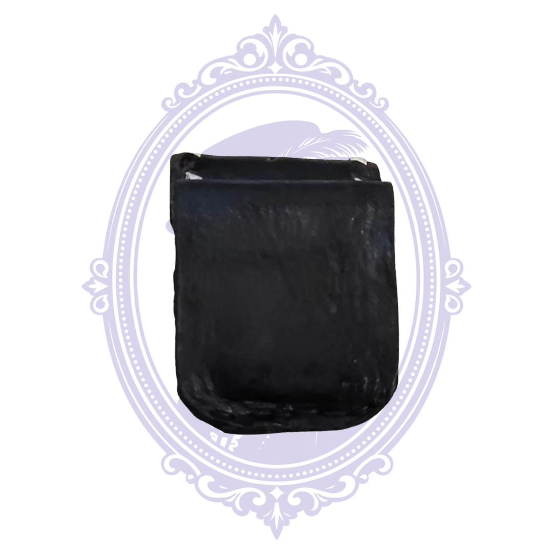 Black leather bull rider mini pouch with measuring tape showing width