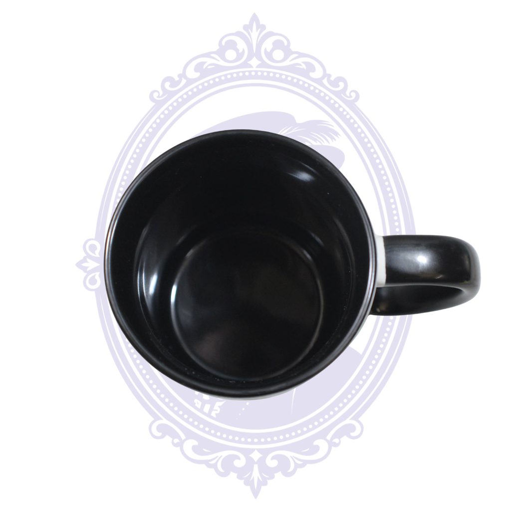 Top view of the 15 oz Freaks ceramic mug showing its glossy black interior and black handle.