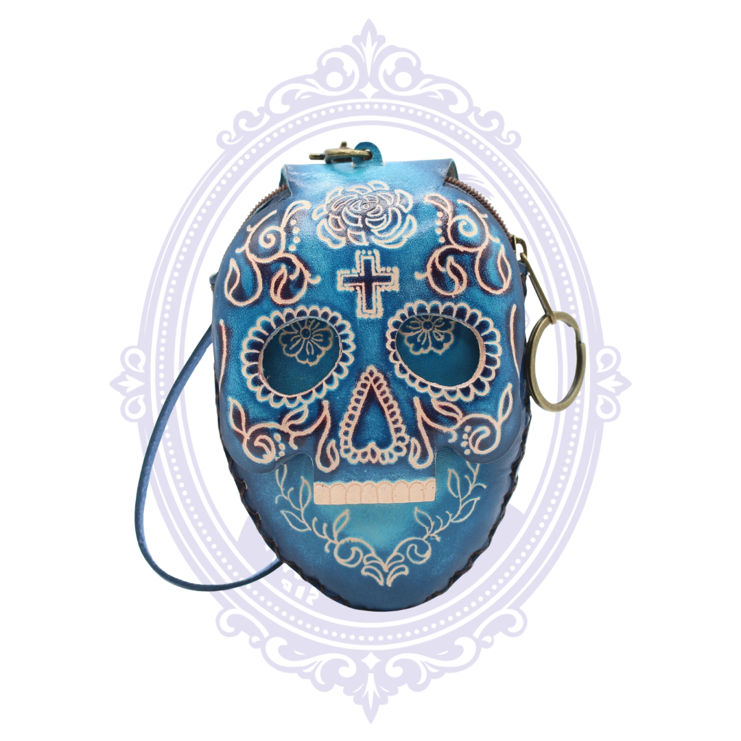 Blue leather sugar skull coin purse with floral tooled-style detailing, wrist strap and key ring.