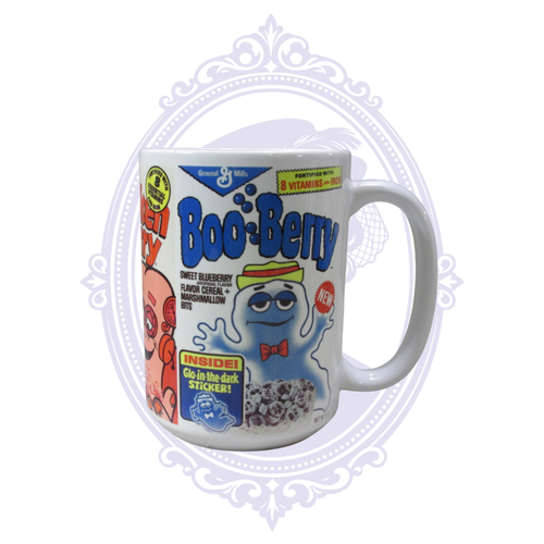 15 oz ceramic coffee mug featuring retro General Mills Boo Berry Monster Cereal box artwork.