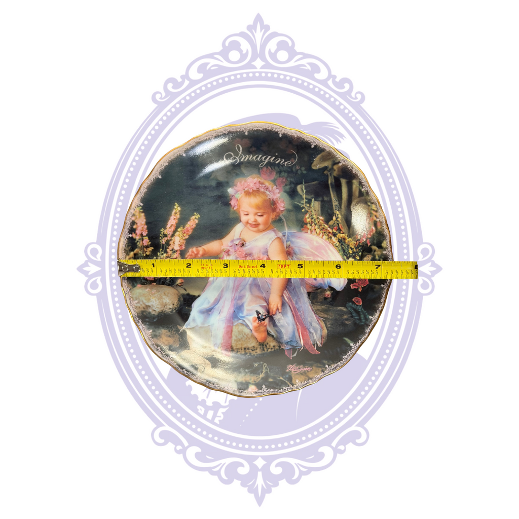 Imagine Tomorrow collector plate with measuring tape
