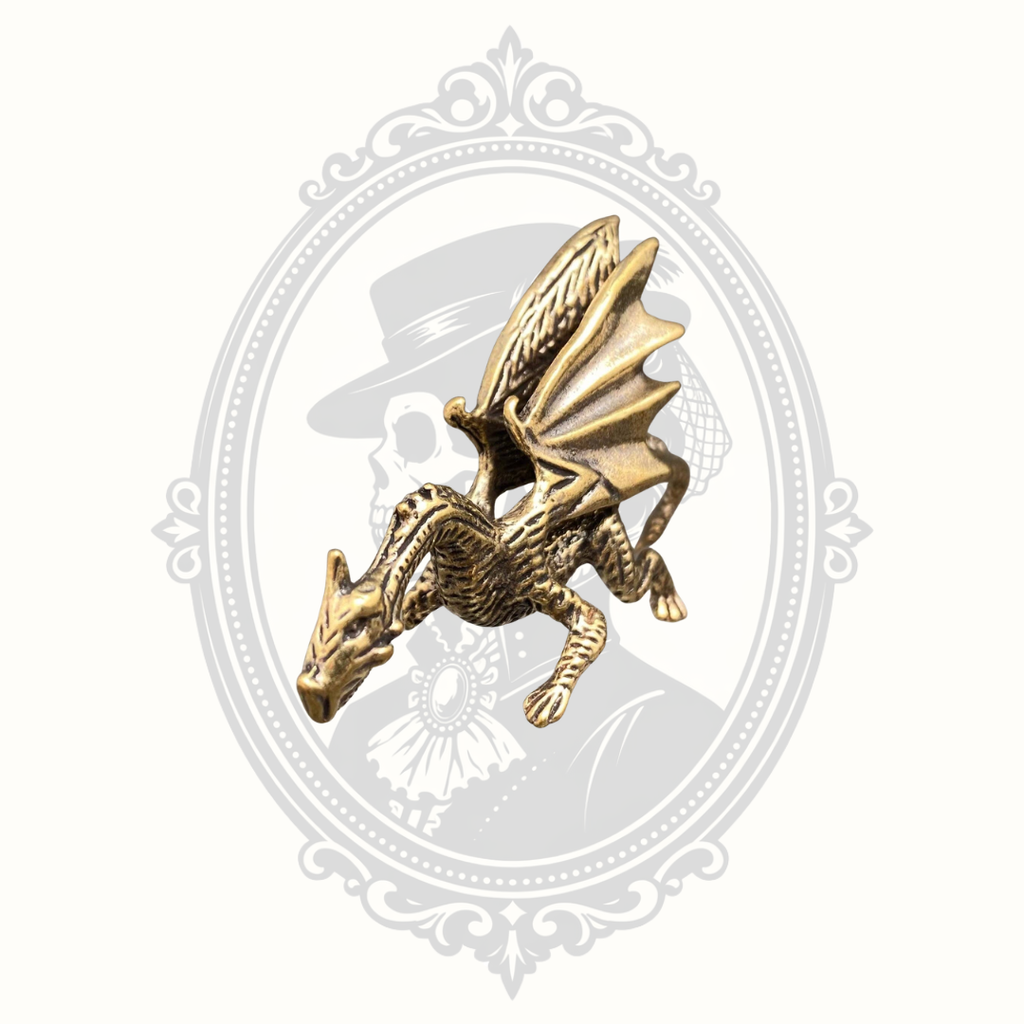 Solid brass dragon desktop ornament displayed from the front.