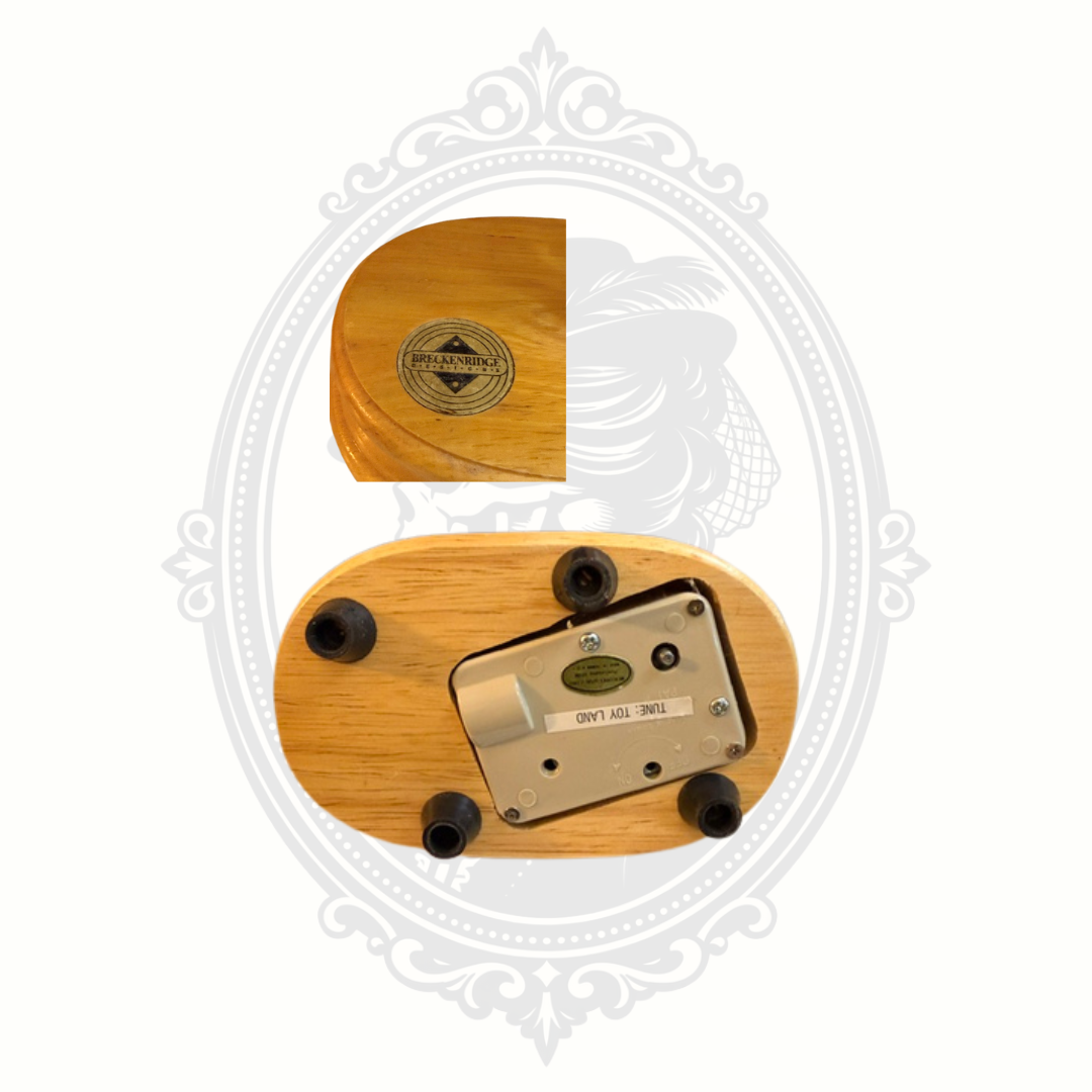 Breckenridge Designs music box featuring carousel pig figurine and ornate vintage-style detailing.