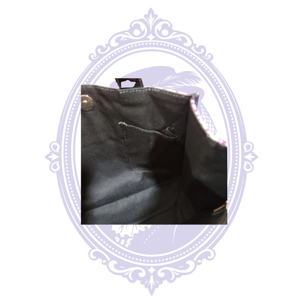 Interior slip pocket of Burberry tote