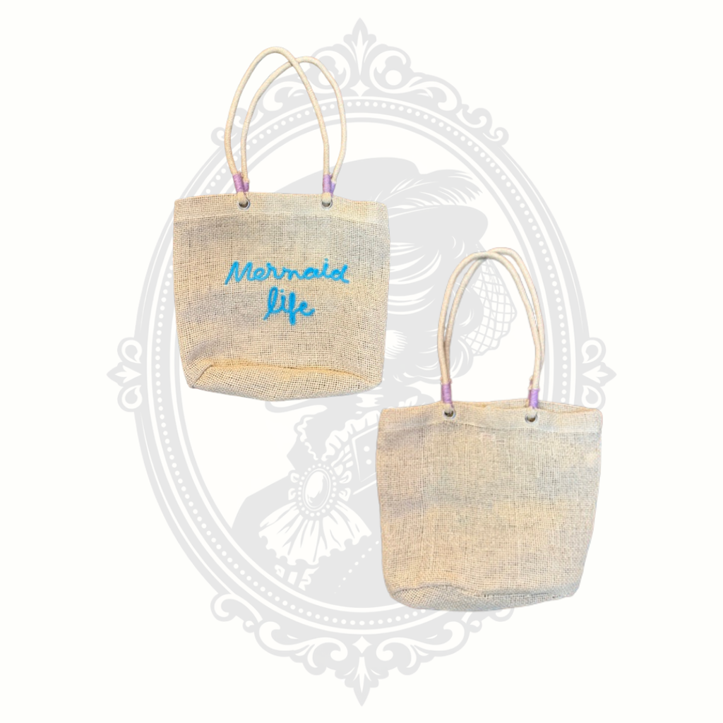 Capelli New York woven mini tote bag with aqua blue “Mermaid Life” embroidery and rope handles front and back