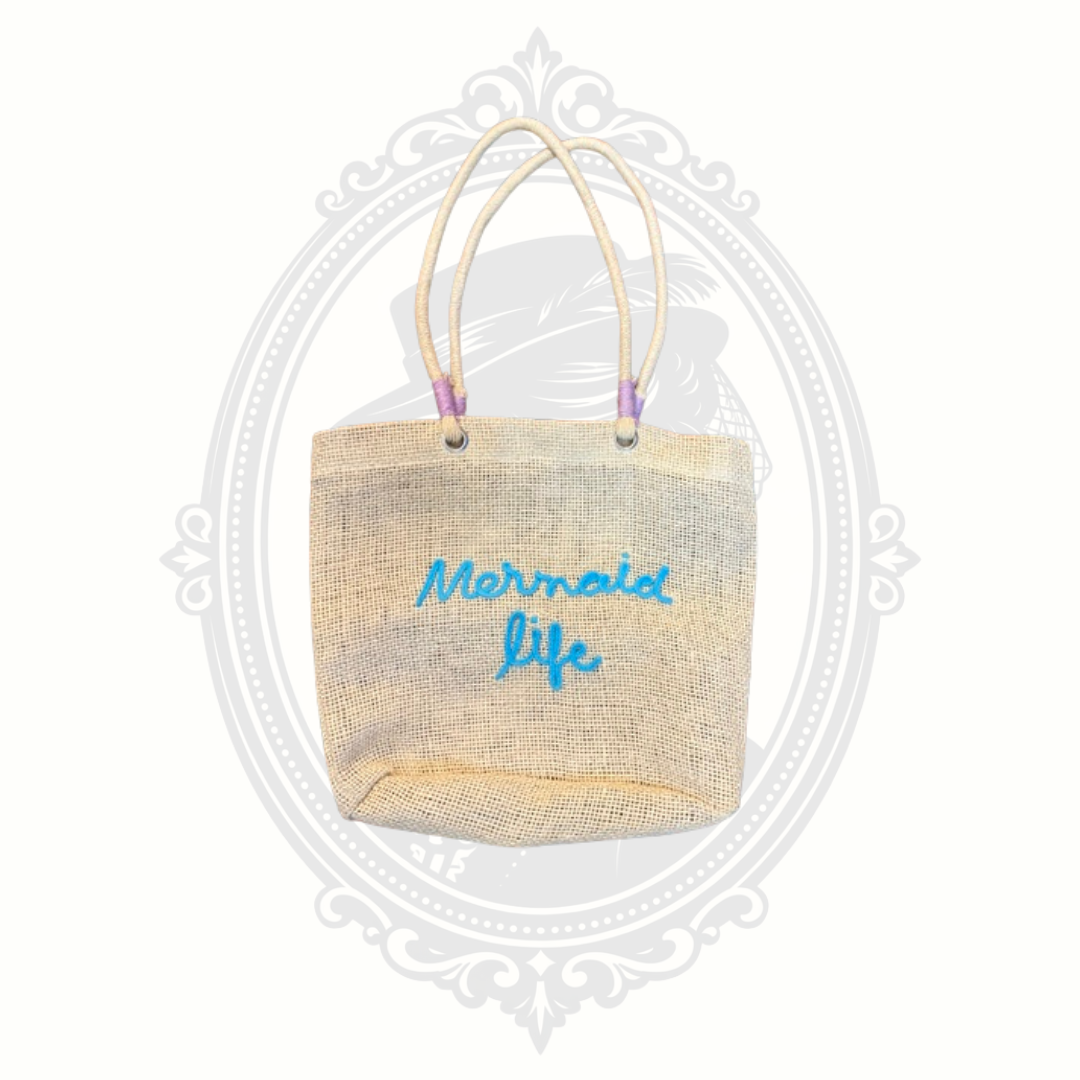 Capelli New York woven mini tote bag with aqua blue “Mermaid Life” embroidery and rope handles