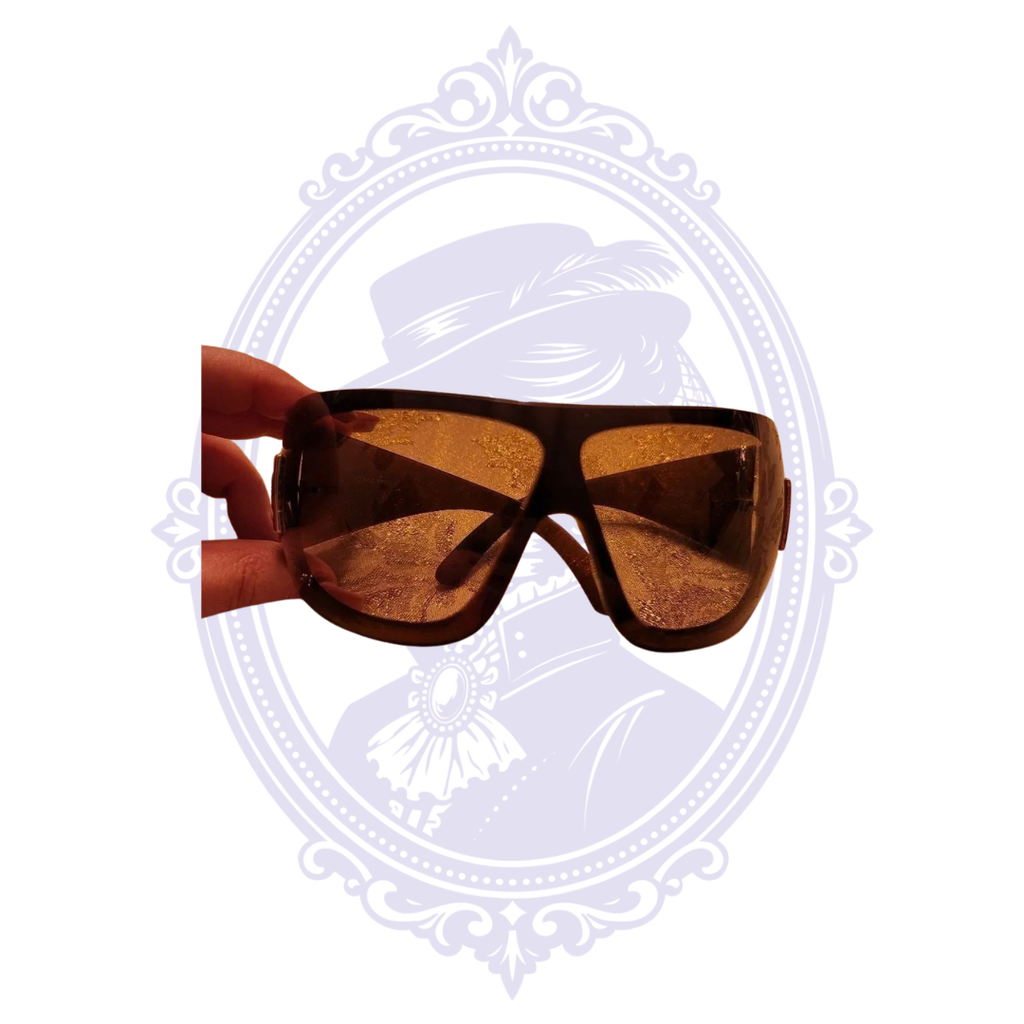 Front view through brown lenses of Chanel 5086 oversized shield sunglasses