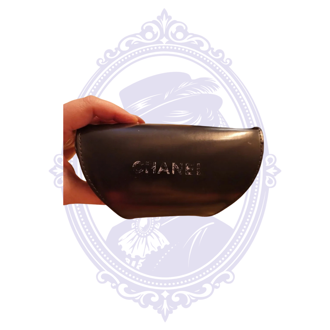 Original Chanel sunglasses case showing wear to exterior CHANEL logo