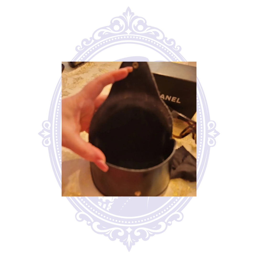 Interior of original Chanel sunglasses case showing pre-owned condition