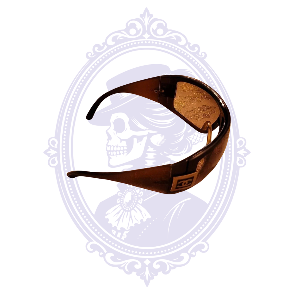 Opposite side view of Chanel 5086 brown wraparound sunglasses and temple