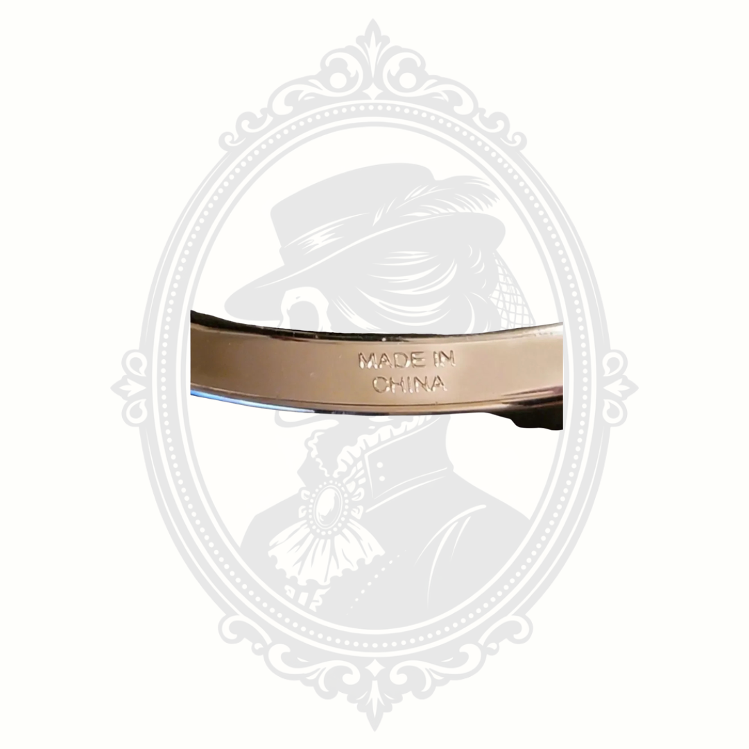 Coach Silver-Tone Bangle Bracelet with Purple Enamel Accents