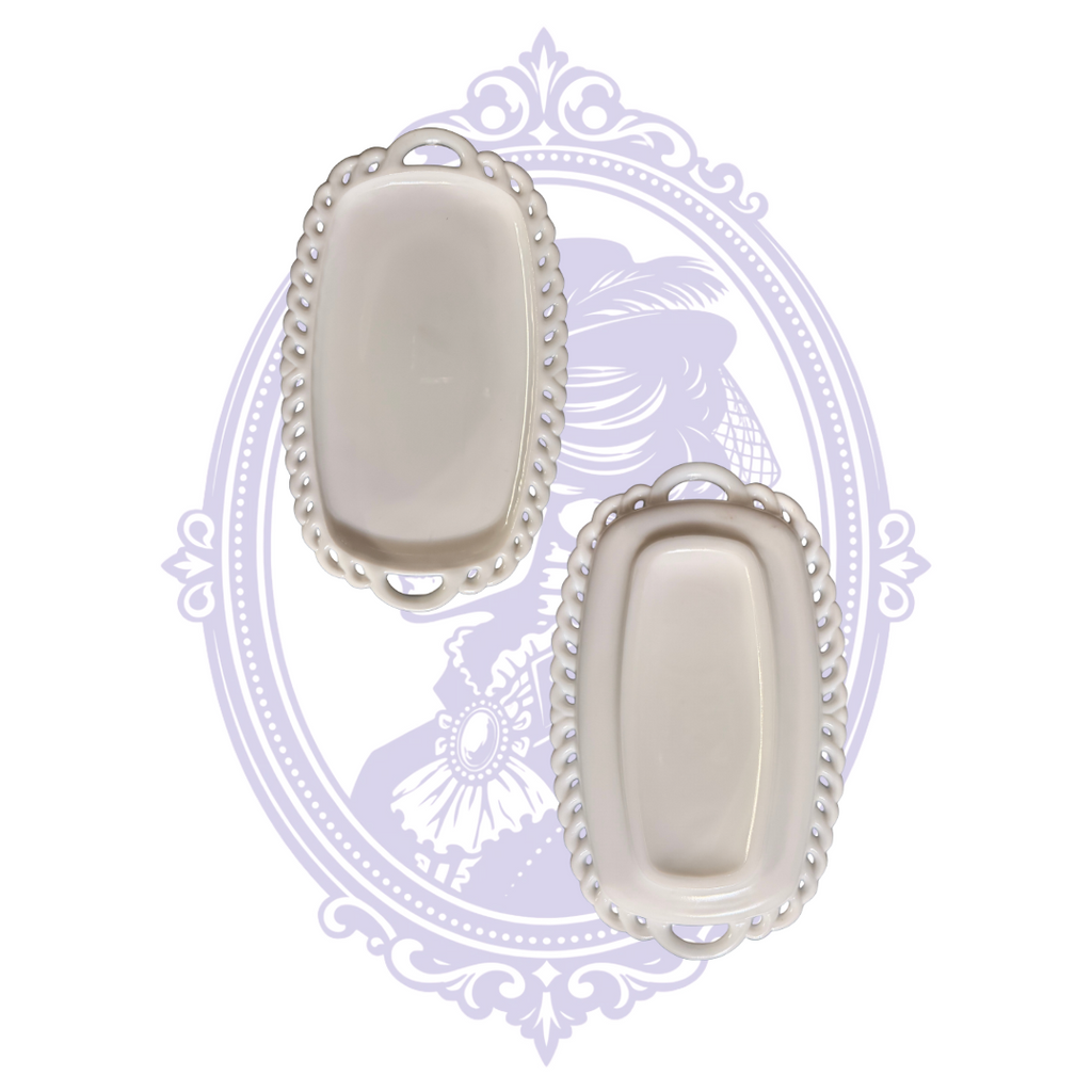 Footed Colony Harvest creamer and open sugar bowl together on decorative pierced-edge milk glass undertray.