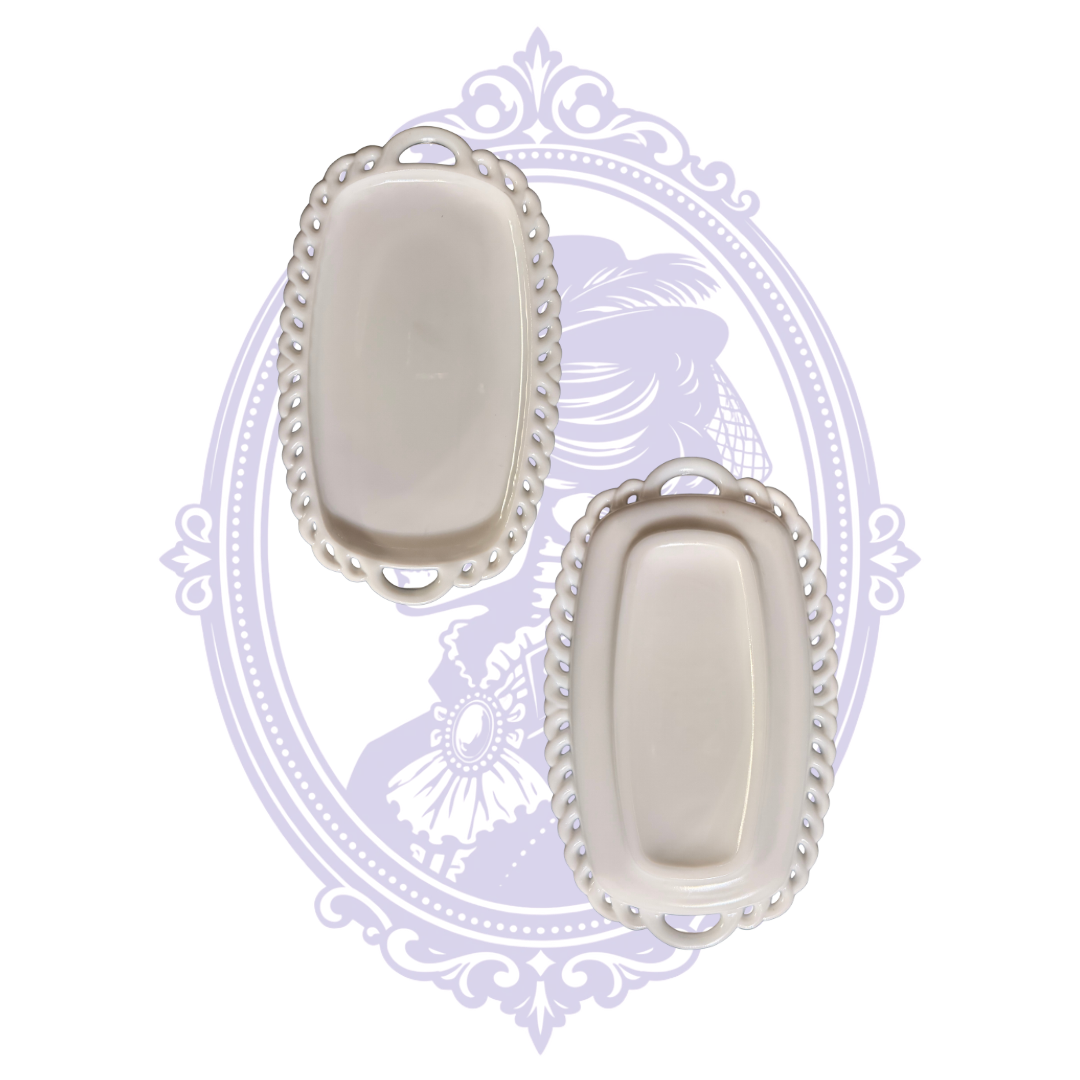 Footed Colony Harvest creamer and open sugar bowl together on decorative pierced-edge milk glass undertray.