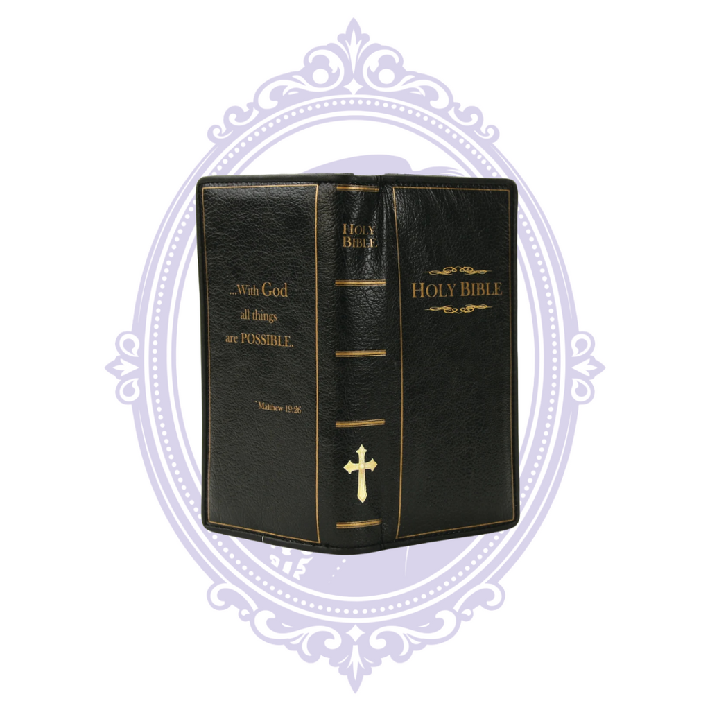 Black vinyl Holy Bible wallet opened to show gold cross and Matthew 19:26 design