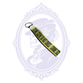 Handmade Crime Scene Do Not Cross wristlet keychain showing yellow neoprene loop and silver-tone key ring